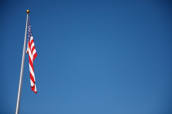 American flag against blue sky